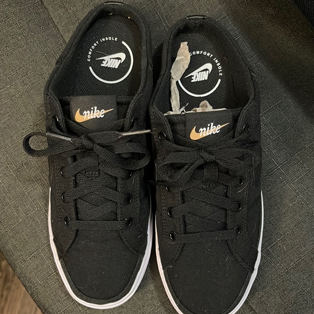 Black and White Nike Women’s Mules